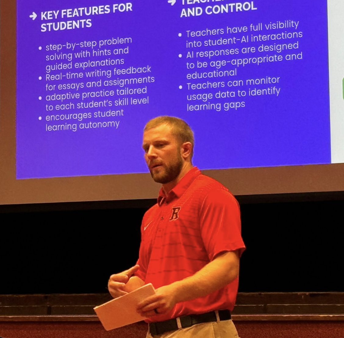 Hunter Hickman speaking on stage during an education AI presentation